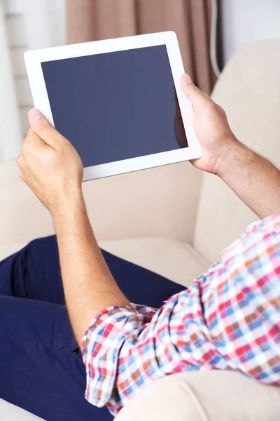 Male hand holding PC tablet — Stock Photo, Image