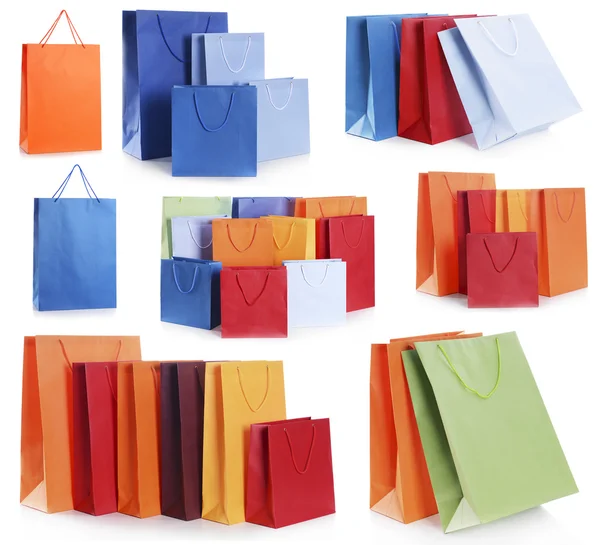 Sacos de compras de papel isolados em branco — Fotografia de Stock