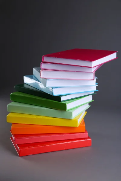 Colorful books on gray background — Stock Photo, Image