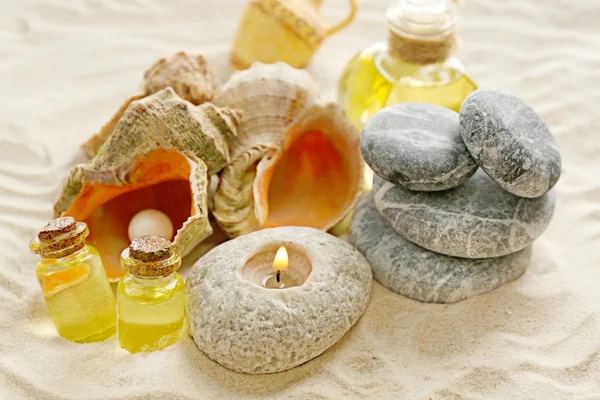 Stack of spa stones on sand background — Stock Photo, Image