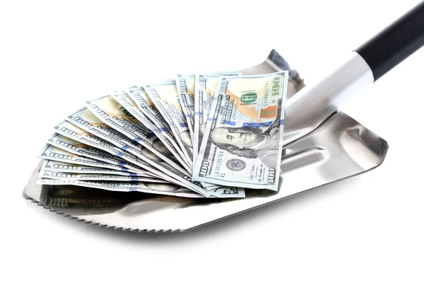 Shovel lifts dollar bills on white background — Stock Photo, Image