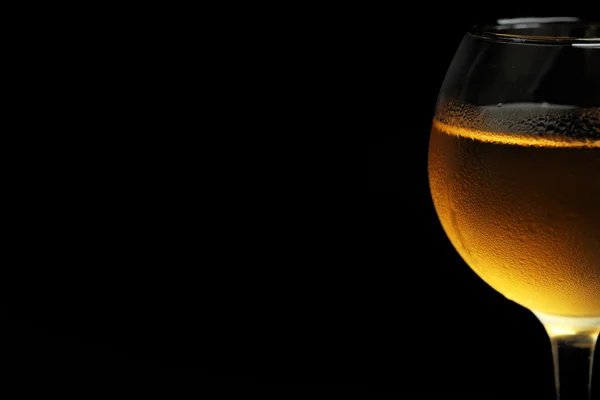 Glass of wine on dark background — Stock Photo, Image