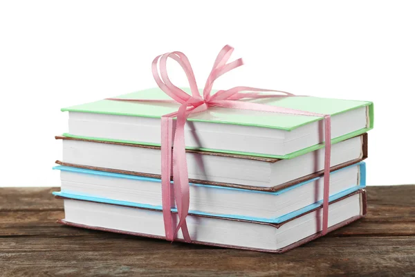 Stack of books with ribbon — Stock Photo, Image