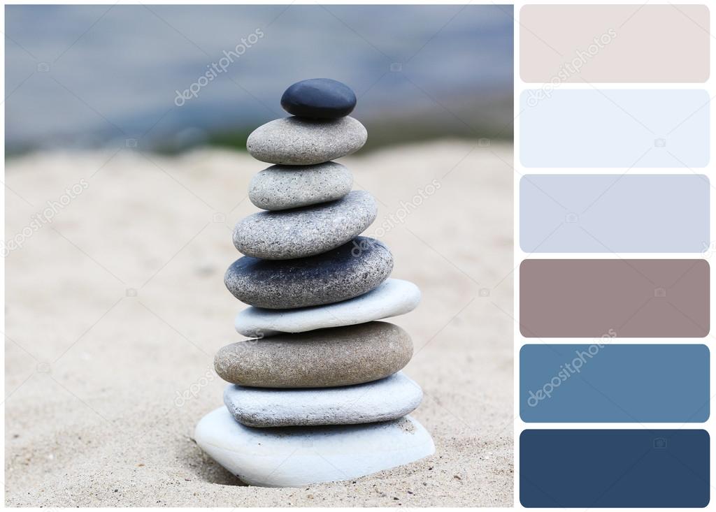 Zen stones balance spa on beach and palette of colors