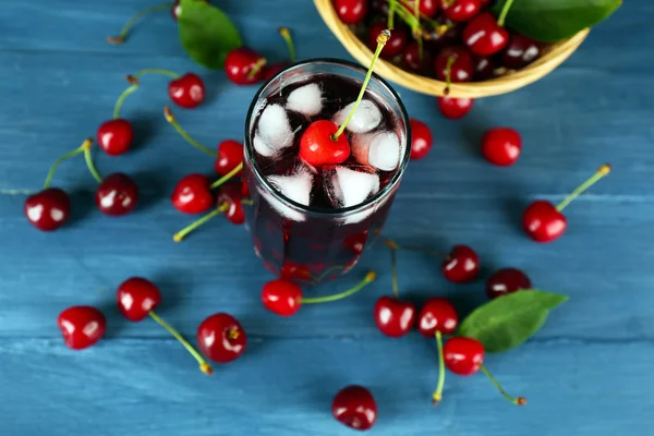 Glass of fresh juice with cherries — Stock Photo, Image