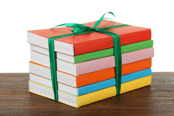 Stack of books with ribbon — Stock Photo, Image