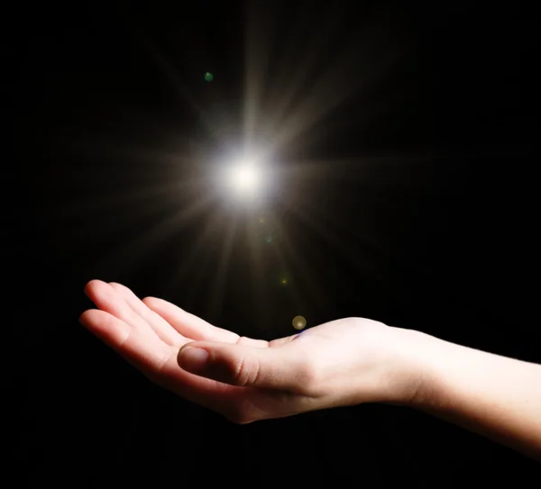 The light in young woman hand — Stock Photo, Image