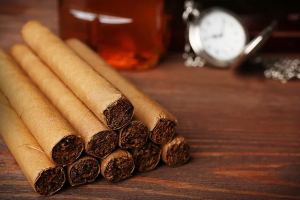 Cigars on wooden table, closeup — Stock Photo, Image