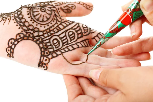 Image of henna applied on female hand isolated on white — Stock Photo, Image