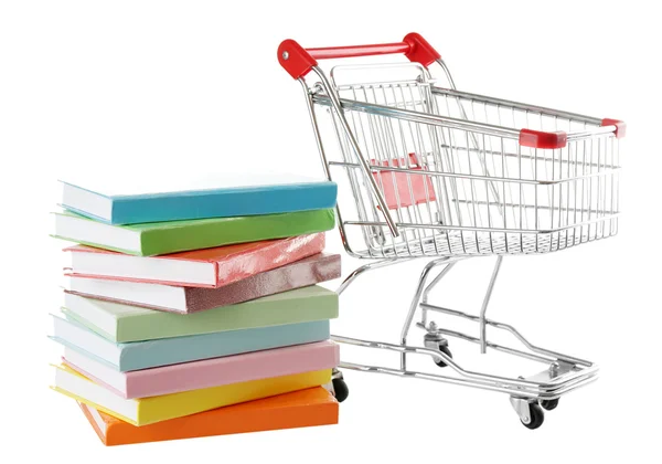 Shopping cart with books isolated on white