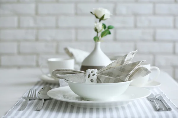 Beautiful holiday table setting in white and gray color — Stock Photo, Image