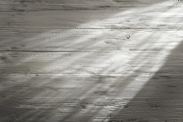 Haz de luz sobre fondo de madera —  Fotos de Stock