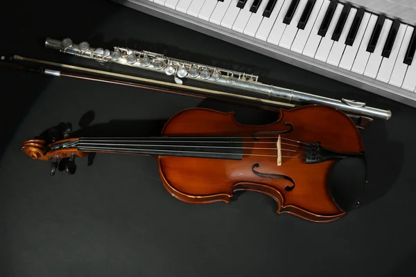 Musical instruments on dark background — Stock Photo, Image