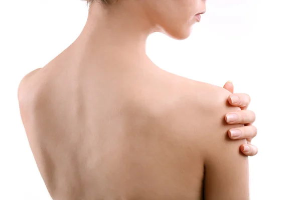 Mladá žena s bolesti ramene zblízka — Stock fotografie