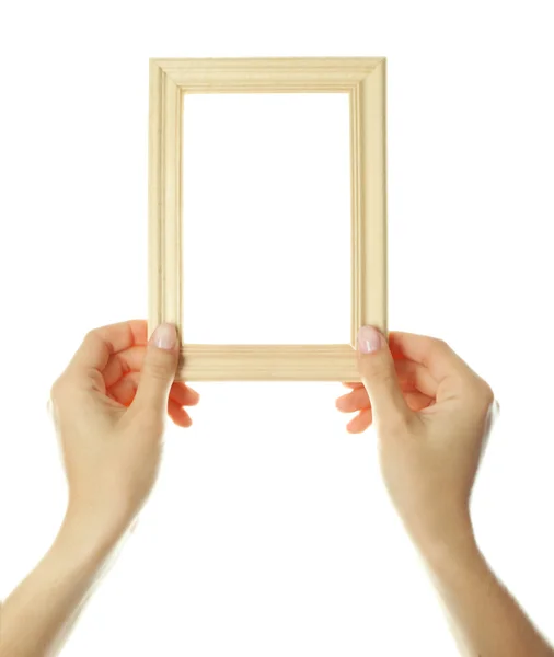 Female hands with wooden frame, isolated on white — Stock Photo, Image