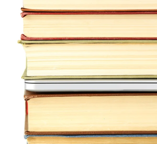 Stack of books with laptop close up — Stock Photo, Image