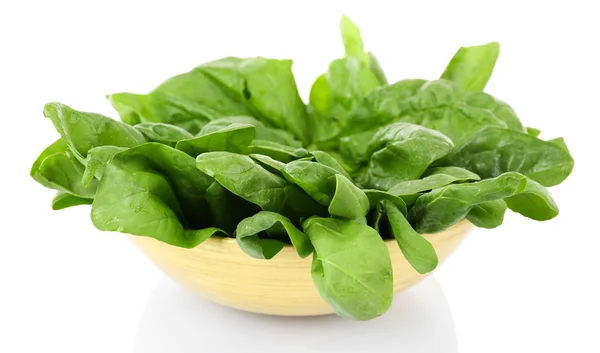 Green fresh leaves of basil in bowl isolated on white — Stock Photo, Image