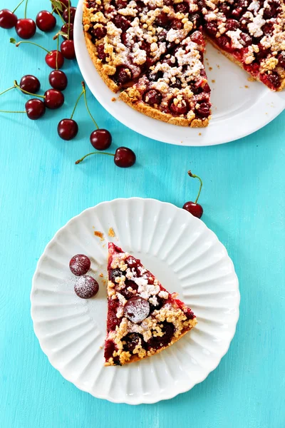 Tasty homemade pie with cherries on table close up — Stock Photo, Image