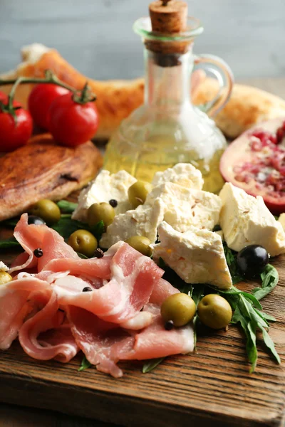 Ingredients of Mediterranean cuisine, on wooden background — Stock Photo, Image