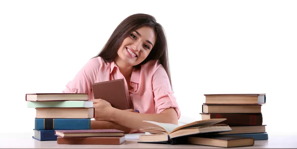 Chica joven con libros aislados en blanco — Foto de Stock