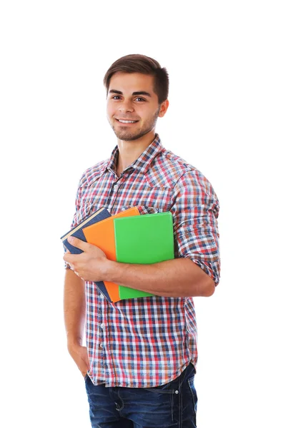 Jongeman met boeken over witte achtergrond — Stockfoto