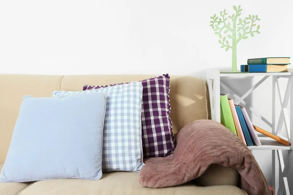 Colorful pillows on sofa, close-up — Stock Photo, Image