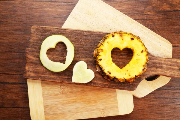 Fruits slices in shape of heart — Stock Photo, Image