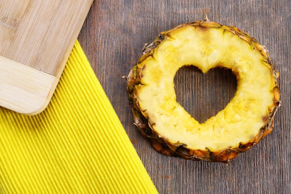 Pineapple slice in shape of heart — Stock Photo, Image