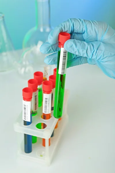 Test tubes with colorful liquid — Stock Photo, Image