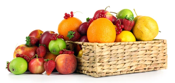 Heap of fresh fruits and berries in basket isolated on white — Stock Photo, Image