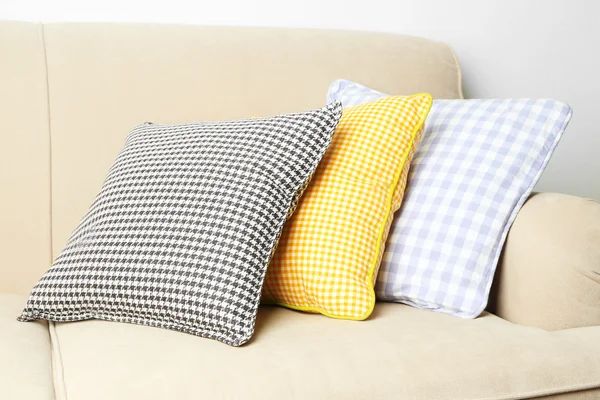 Colorful pillows on sofa — Stock Photo, Image