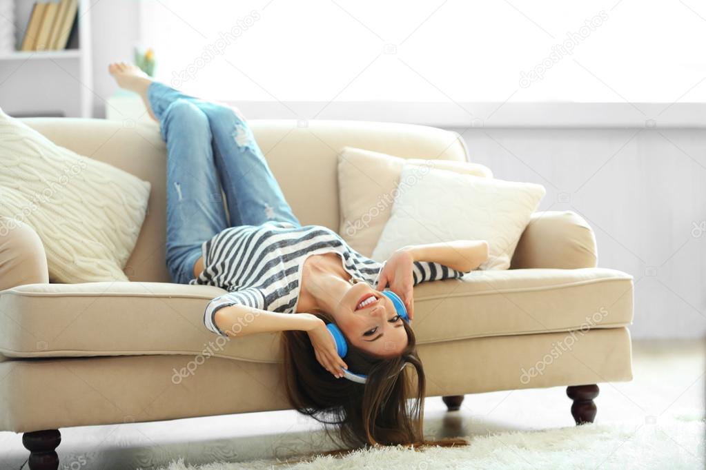 Woman listening music in headphones