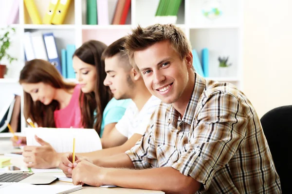 Students sitting in classroom — Stock Photo, Image