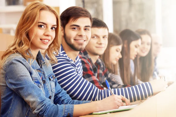 Students sitting in classroom — Stock Photo, Image