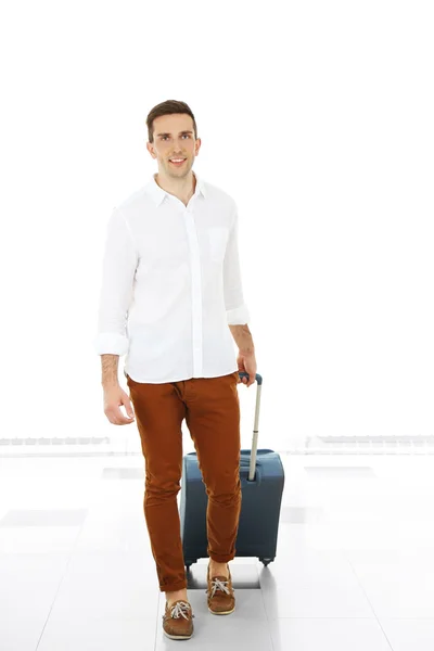 Man holding suitcase — Stock Photo, Image