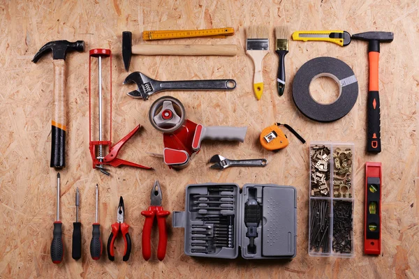 Set of tools on plywood — Stock Photo, Image