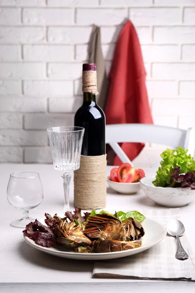 Roasted artichokes on plate — Stock Photo, Image