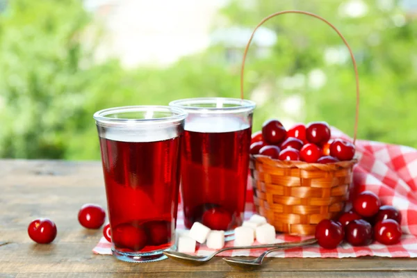 Glasses of sweet homemade cherry compote — Stock Photo, Image