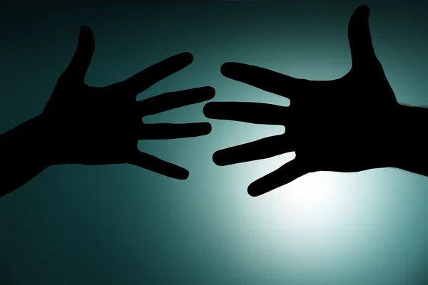 Silhouette delle mani gesticolando — Foto Stock