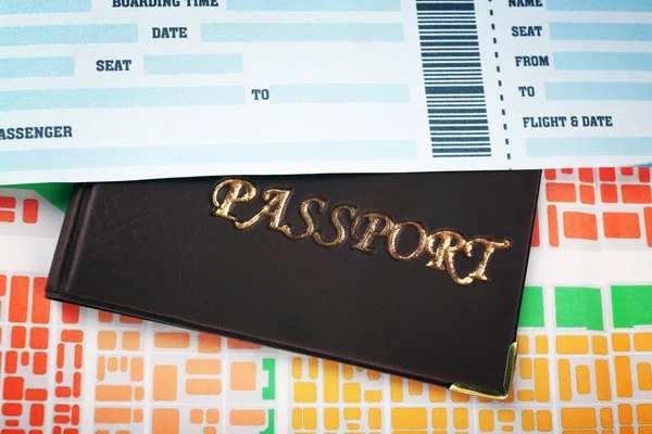 Passport with ticket on map — Stock Photo, Image