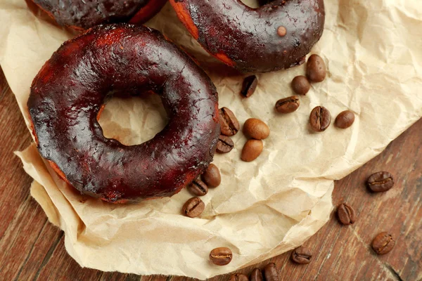 Delicious doughnuts with chocolate icing — Stock Photo, Image