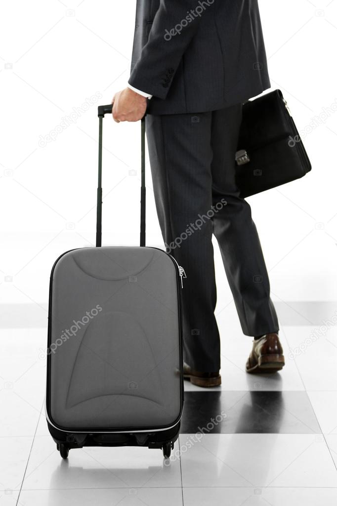 Man holding suitcase 