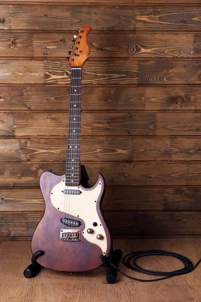 Electric guitar on wooden — Stock Photo, Image