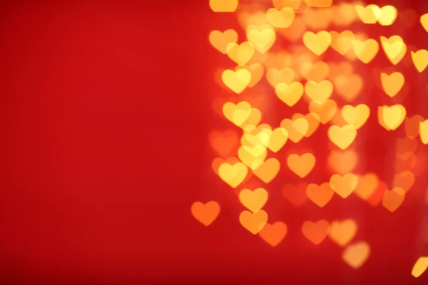 Festive background of lights in hearts shape — Stock Photo, Image