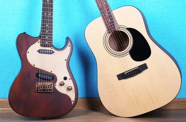 Guitars on blue wallpaper background — Stock Photo, Image