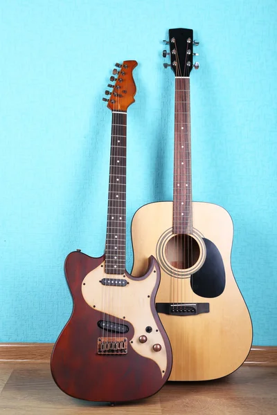 Guitars on blue wallpaper background — Stock Photo, Image