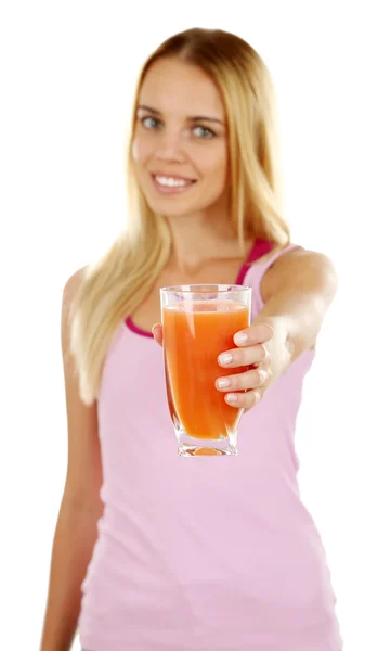 Junge Frau mit einem Glas Grapefruitsaft — Stockfoto