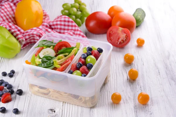 Tasty lunch in plastic containers — Stock Photo, Image