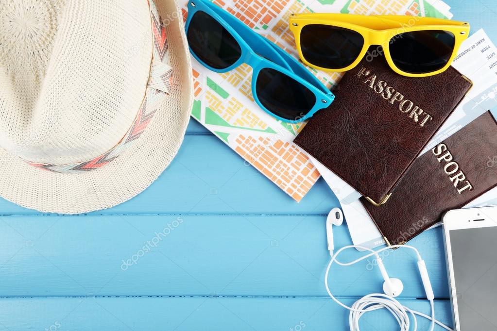 Sunglasses, passport and map