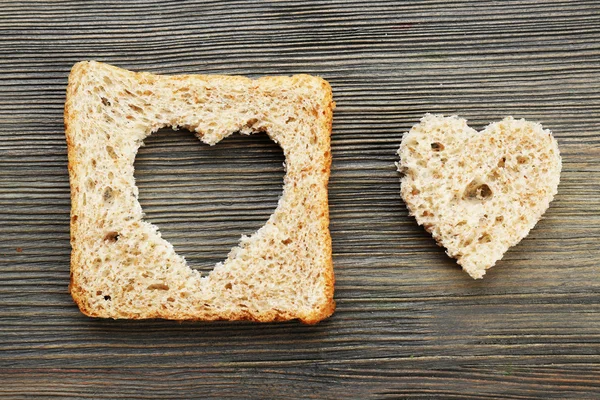 Brotscheibe mit Schnitten — Stockfoto